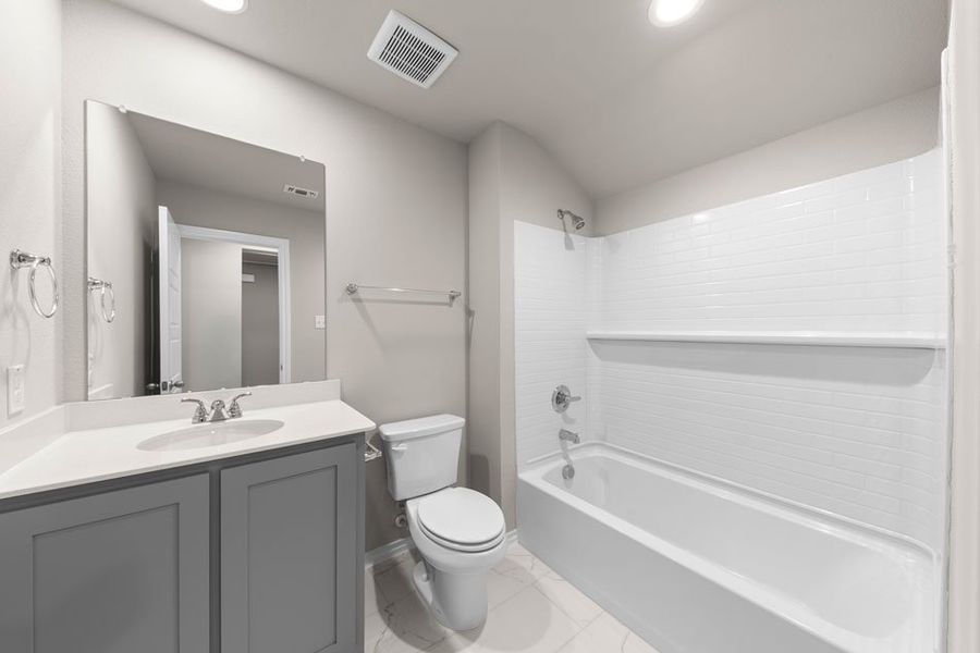 Front exterior of a new home in Heartland, Heartland, TX, highlighting curb appeal (Image 26). Front exterior of a new home in Heartland, Heartland, TX, highlighting curb appeal (Image 26).