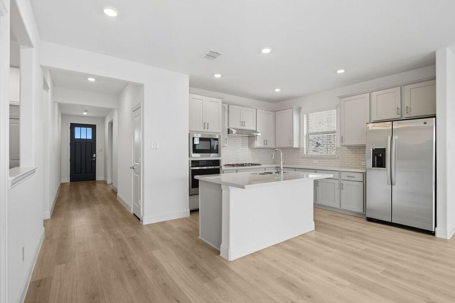 Representative furnished interior of a home built from the Rayburn by Taylor Morrison in Madero 50s, Fort Worth (Image 10).