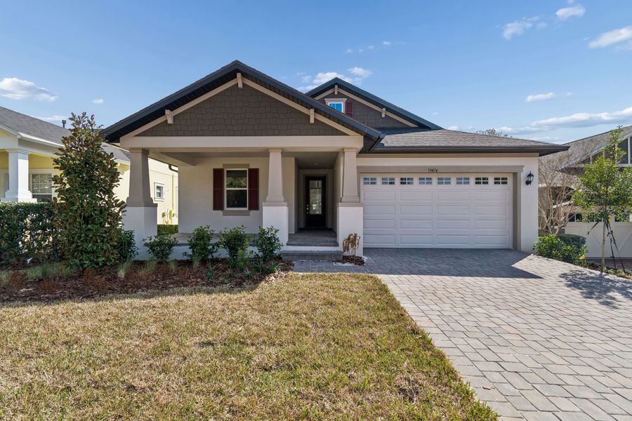 Front exterior of a new home in Southern Hills Plantation, Brooksville, FL, highlighting curb appeal (Image 27).