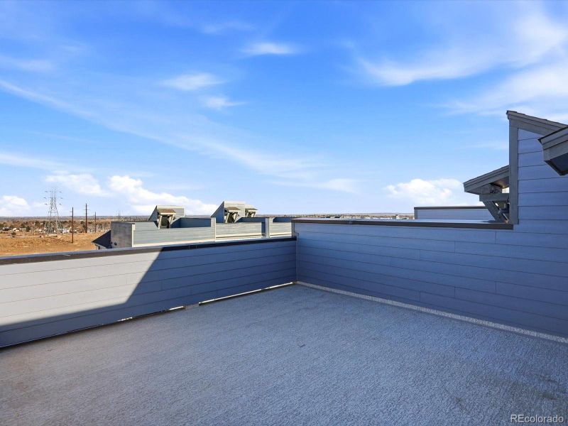 Exterior details and patio area of a home in Three Hills, Morrison (Image 23).