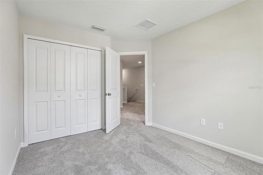 Spacious, unfurnished interior of a new home in Tyson Ranch, Orlando (Image 11).