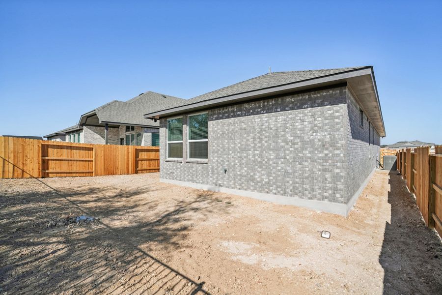 Exterior details and patio area of a home in Meyer Ranch, New Braunfels (Image 26).