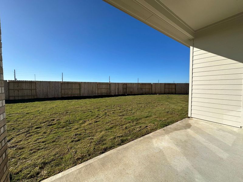 Exterior details and patio area of a home in Rates starting as low as, Iowa Colony (Image 17).
