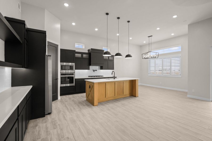 Representative furnished interior of a home built from the Pebble Beach- II by LEH. Homes in Verdancia, El Paso (Image 13).
