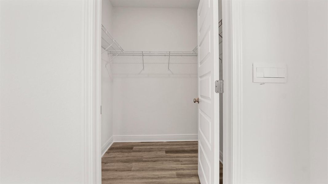 Representative furnished interior of a home built from the Madison by D.R. Horton in Owl's Head Farms, Freeport (Image 14).