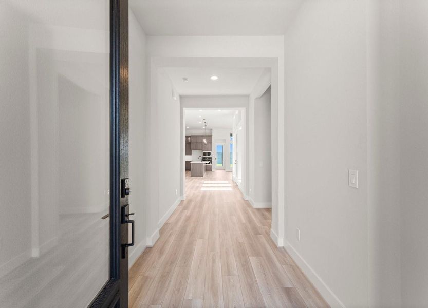 Open the Entry Door to Reveal Luxury Vinyl Plank Flooring Open the Entry Door to Reveal Luxury Vinyl Plank Flooring