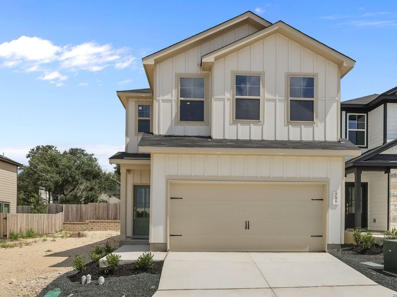 Front exterior of a new home in Meadows at Oak Creek, San Antonio, TX, highlighting curb appeal (Image 24). Front exterior of a new home in Meadows at Oak Creek, San Antonio, TX, highlighting curb appeal (Image 24).