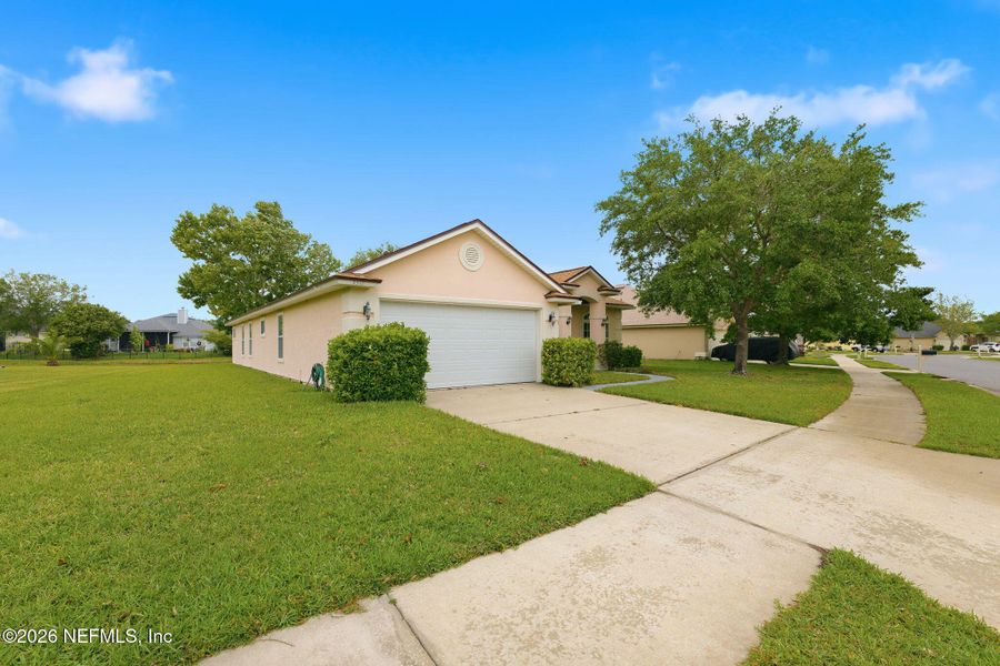 Front exterior of a new home in , Jacksonville, FL, highlighting curb appeal (Image 23).