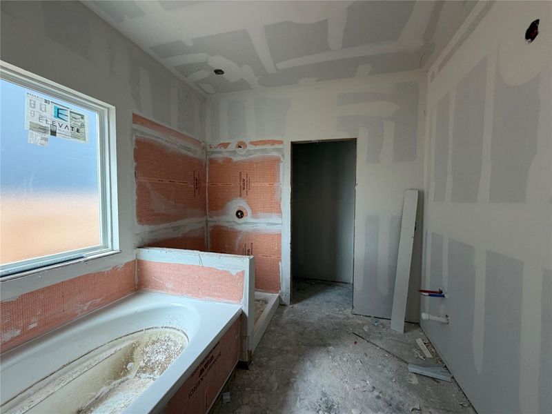 In-progress construction of a new home in Lariat, Liberty Hill, TX (Image 17).