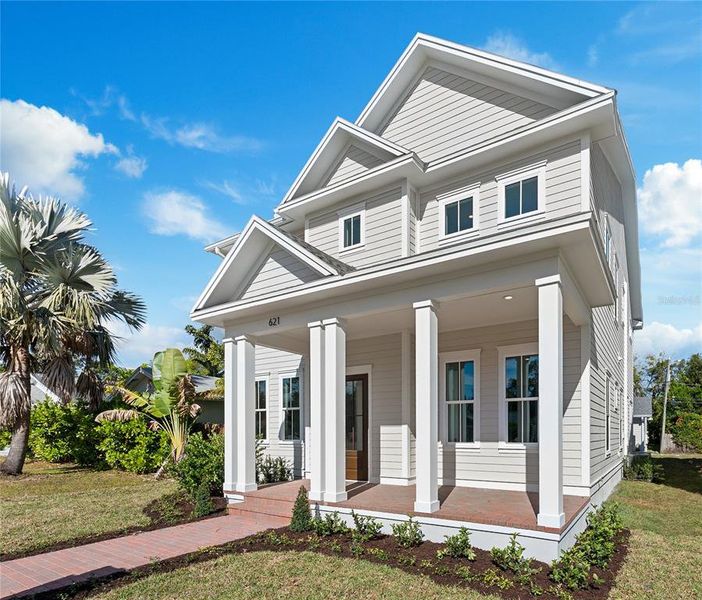 Front exterior of a new home in , St. Petersburg, FL, highlighting curb appeal (Image 2). Front exterior of a new home in , St. Petersburg, FL, highlighting curb appeal (Image 2).