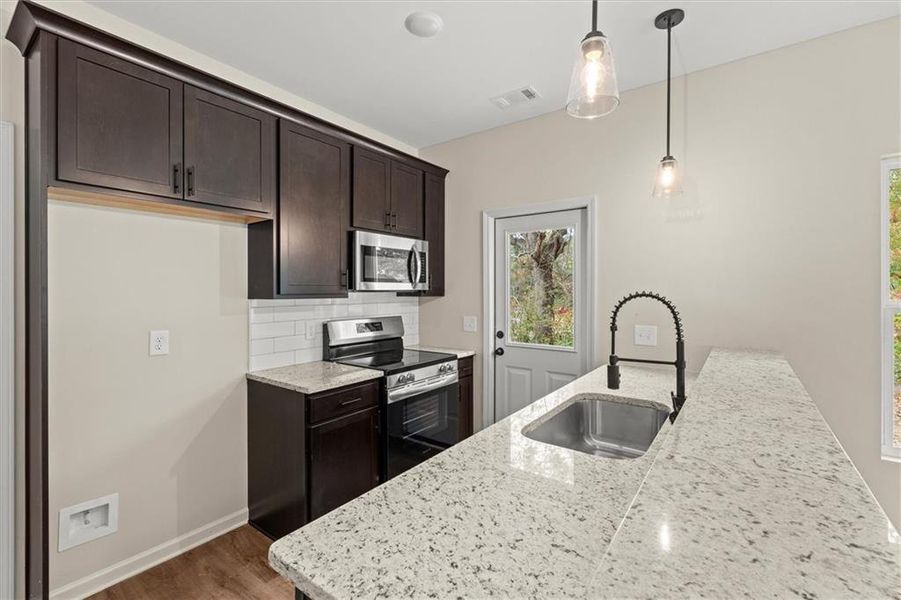 Furnished interior view inside a new home in , Carrollton (Image 6).