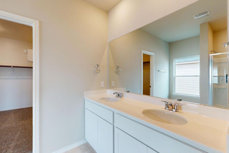 Furnished interior view inside a new home in Carillon, Manor (Image 11).