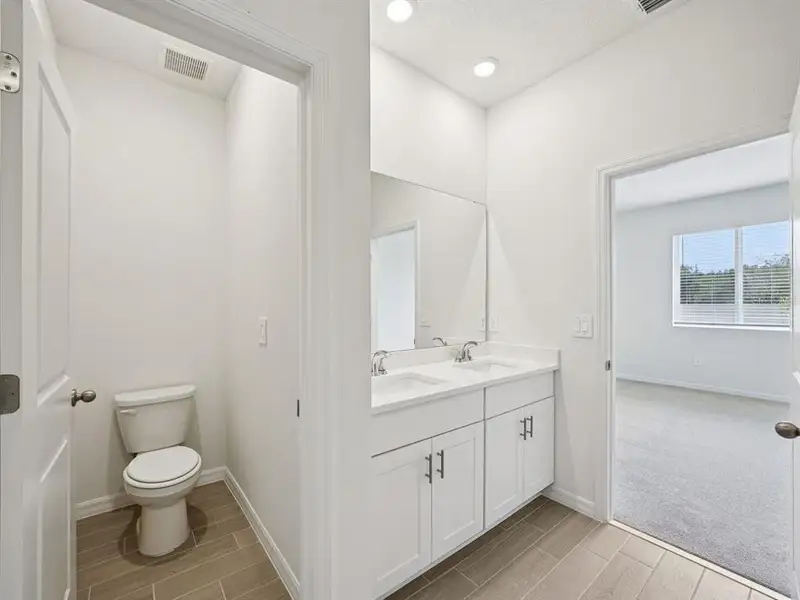 Furnished interior view inside a new home in Oakfield Trails - Classic Series, Parrish (Image 3).