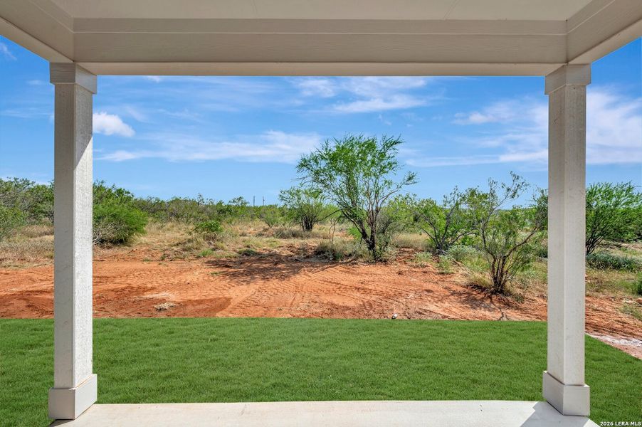 Exterior details and patio area of a home in Chaparral Ranch, Floresville (Image 3).