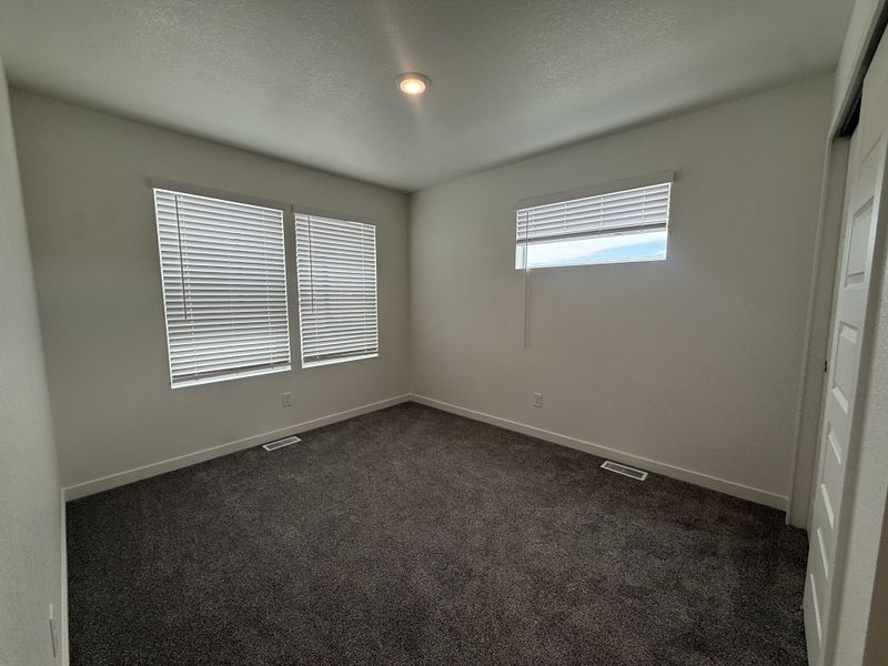 Spacious, unfurnished interior of a new home in Granary, Johnstown (Image 32).