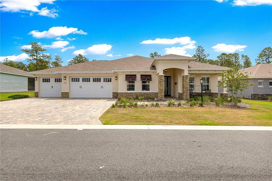 Front exterior of a new home in , Ocala, FL, highlighting curb appeal (Image 2). Front exterior of a new home in , Ocala, FL, highlighting curb appeal (Image 2).