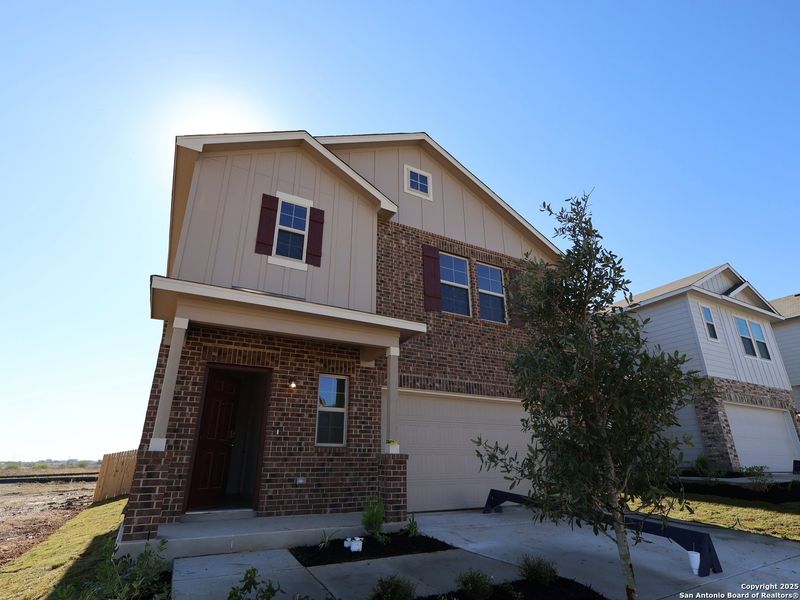 Front exterior of a new home in Paloma Park, Converse, TX, highlighting curb appeal (Image 1). Front exterior of a new home in Paloma Park, Converse, TX, highlighting curb appeal (Image 1).
