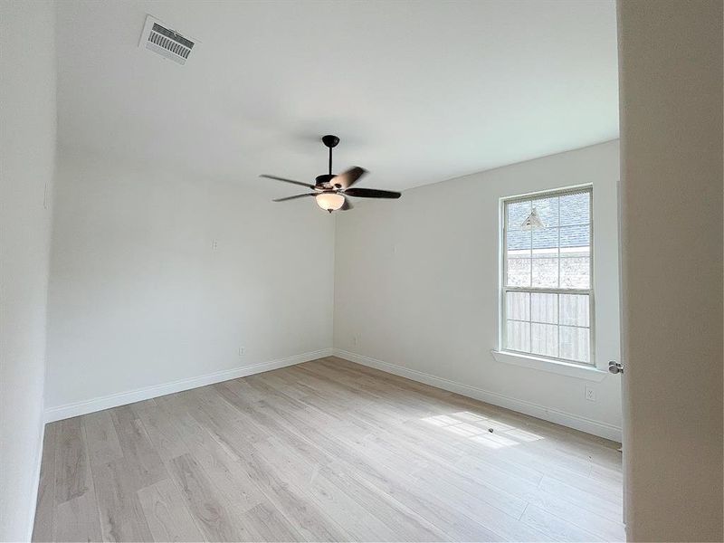 Secondary bedroom that is separated from the other two bedrooms