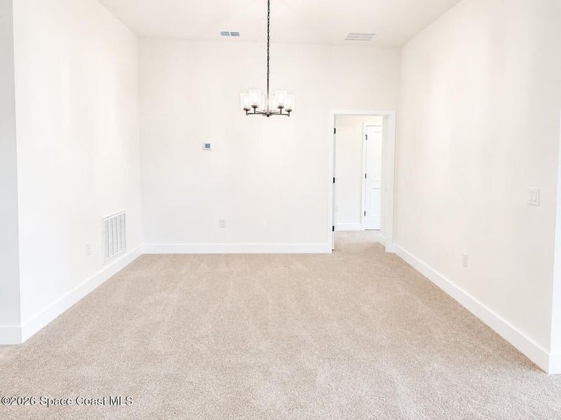 Spacious, unfurnished interior of a new home in St. John's Preserve, Palm Bay (Image 23).