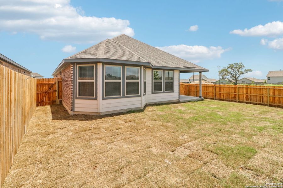 Front exterior of a new home in Kallison Ranch, San Antonio, TX, highlighting curb appeal (Image 27).