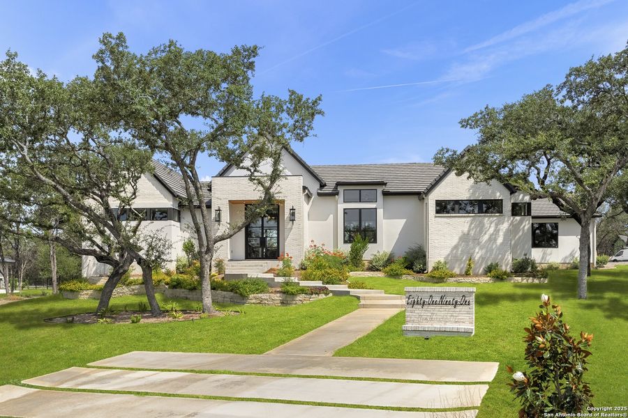 Front exterior of a new home in , San Antonio, TX, highlighting curb appeal (Image 20).
