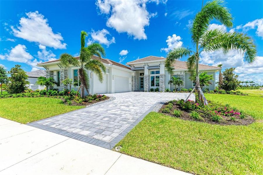 Front exterior of a new home in , Venice, FL, highlighting curb appeal (Image 19).