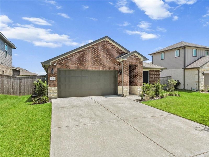 Front exterior of a new home in , Texas City, TX, highlighting curb appeal (Image 21). Front exterior of a new home in , Texas City, TX, highlighting curb appeal (Image 21).