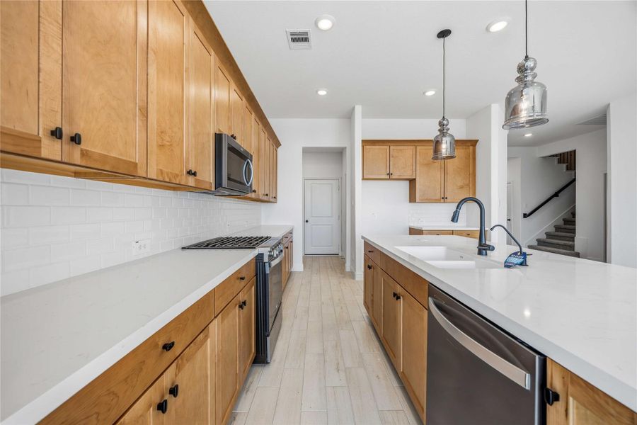 Furnished interior view inside a new home in Sienna, Missouri City (Image 8).