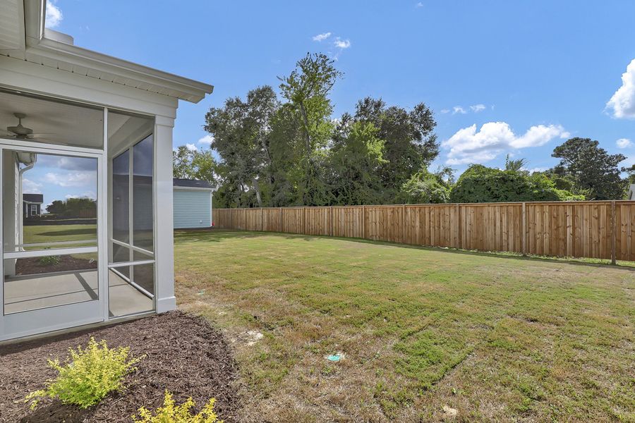 Exterior details and patio area of a home in East Wynd, Hampstead (Image 21). Exterior details and patio area of a home in East Wynd, Hampstead (Image 21).