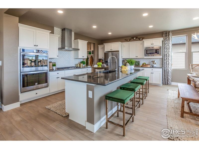 EXAMPLE PHOTO: SPACIOUS KITCHEN W/ ISLAND