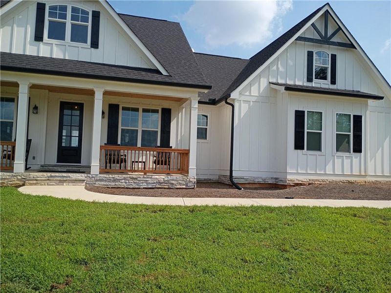 Front exterior of a new home in , Dallas, GA, highlighting curb appeal (Image 2).