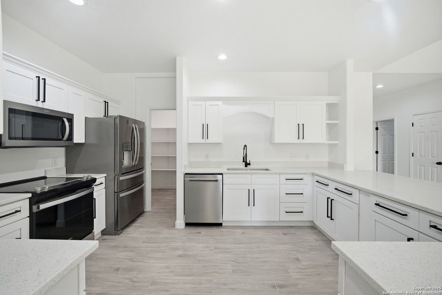 Furnished interior view inside a new home in , Lakehills (Image 9). Furnished interior view inside a new home in , Lakehills (Image 9).