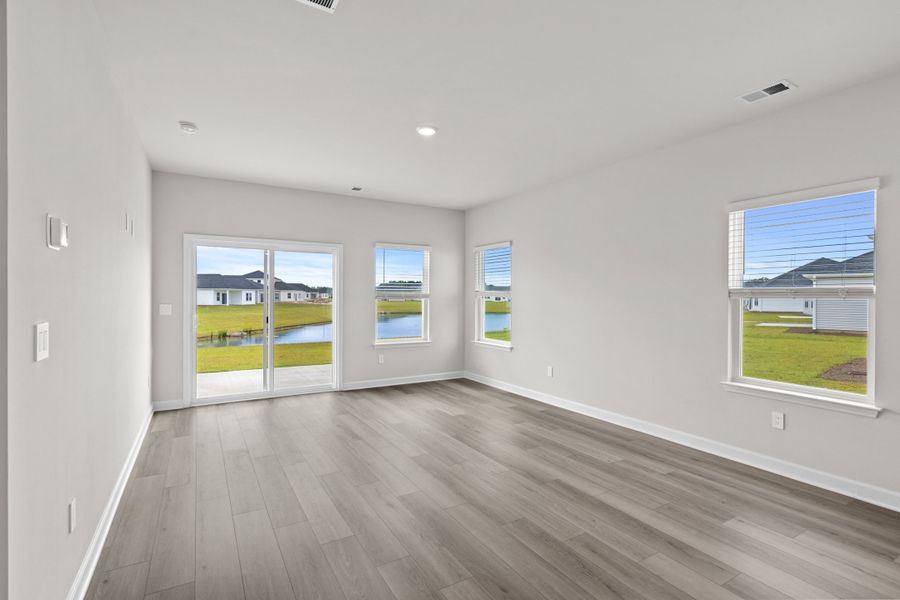 Spacious, unfurnished interior of a new home in Cypress Ridge - The Boardwalk Series, Longs (Image 17).
