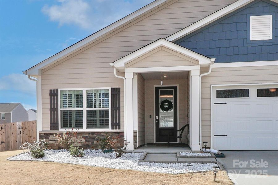 Exterior details and patio area of a home in Colonial Crossing, Troutman (Image 26). Exterior details and patio area of a home in Colonial Crossing, Troutman (Image 26).