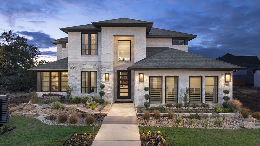 Front exterior of a new home in Santa Rita Ranch - Eldorado, Liberty Hill, TX, highlighting curb appeal (Image 22).