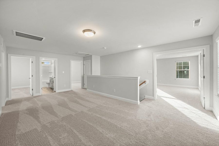 Spacious, unfurnished interior of a new home in Cottages at Piper Village, Trinity (Image 27).