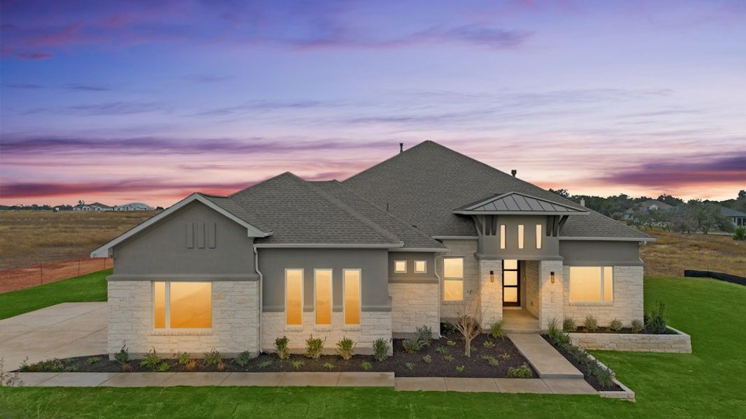 Front exterior of a new home in Leander Estates, Leander, TX, highlighting curb appeal (Image 1). Front exterior of a new home in Leander Estates, Leander, TX, highlighting curb appeal (Image 1).