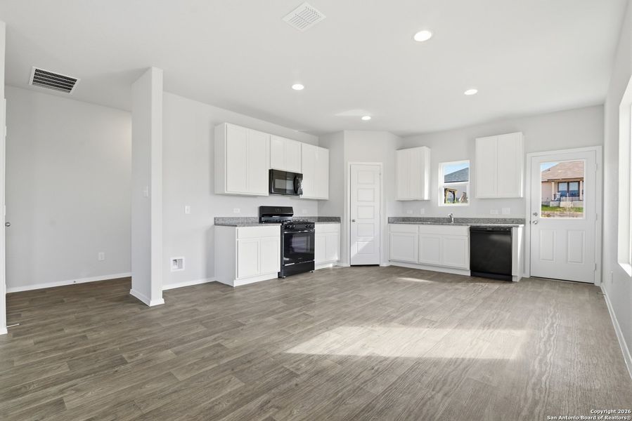 Furnished interior view inside a new home in Hunters Ranch, San Antonio (Image 7).