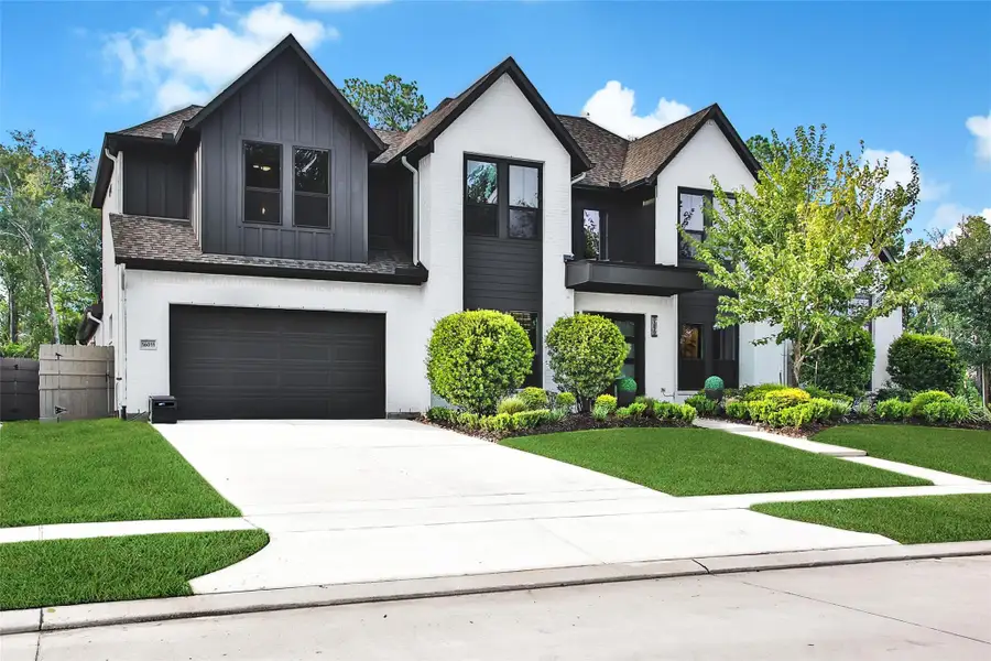 Front exterior of a new home in ARTAVIA, Conroe, TX, highlighting curb appeal (Image 2).