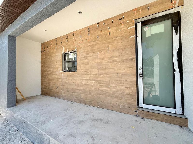 Exterior details and patio area of a home in , Port Charlotte (Image 13).