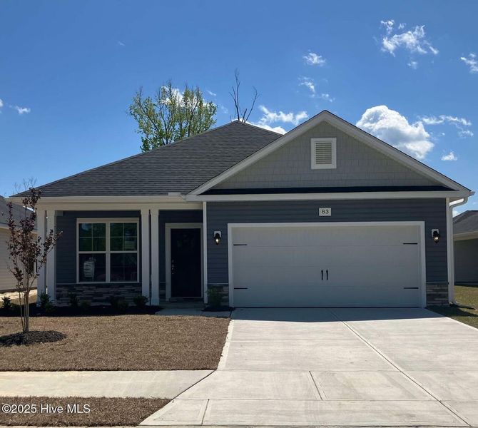 Front exterior of a new home in Belle Oaks, New Bern, NC, highlighting curb appeal (Image 1). Front exterior of a new home in Belle Oaks, New Bern, NC, highlighting curb appeal (Image 1).