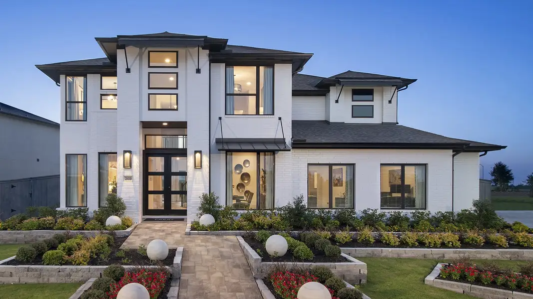 Front exterior of a new home in Juniper Springs, Lockhart, TX, highlighting curb appeal (Image 2).
