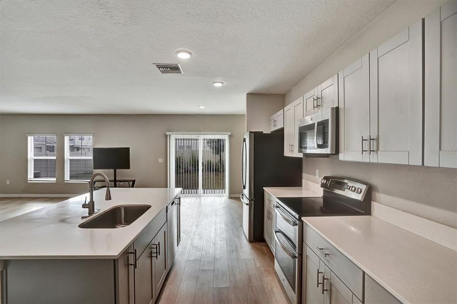 Furnished interior view inside a new home in Hammock Reserve, Haines City (Image 14).