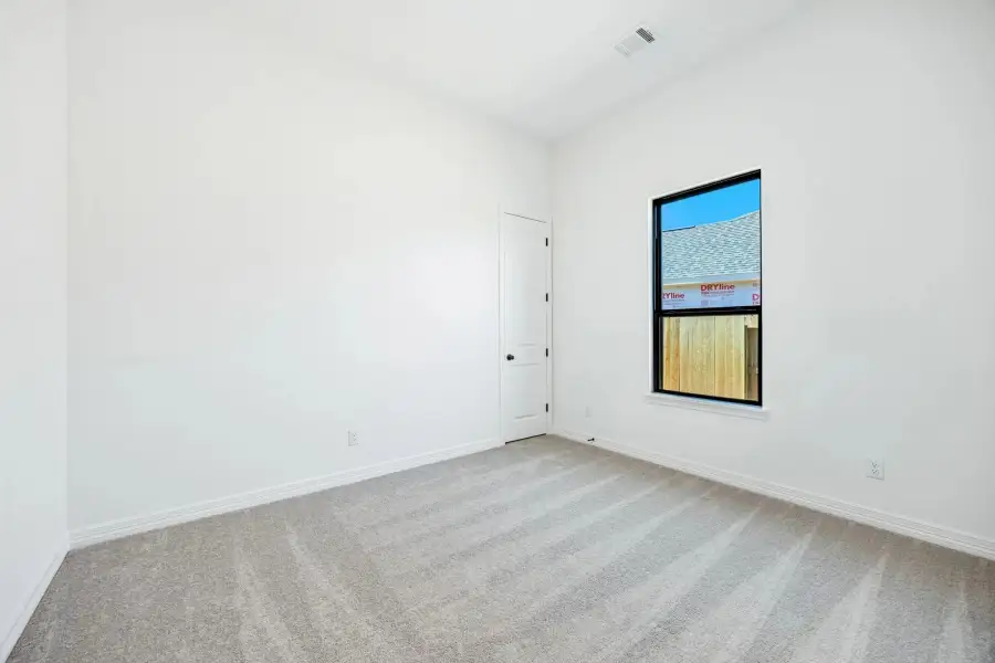Secondary bedroom. Sample product photo. Actual exterior and interior selections may vary by homesite. Photo may be virtually staged.