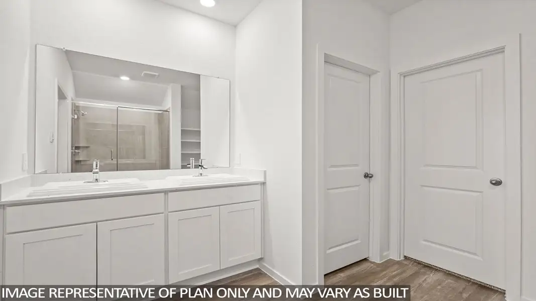 Furnished interior view inside a new home in Sunterra, Katy (Image 10).