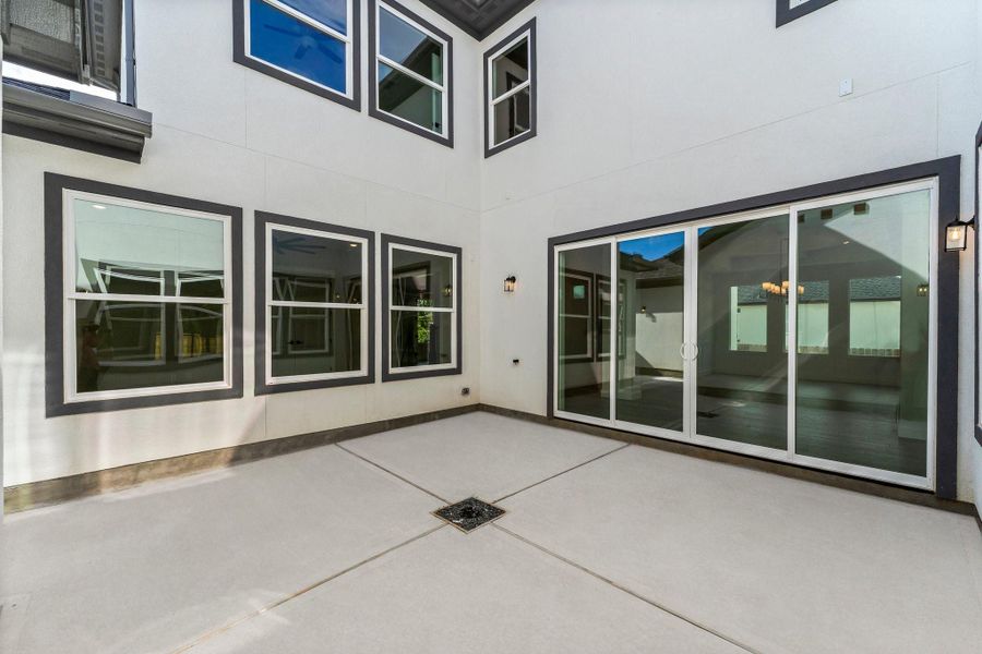 Exterior details and patio area of a home in , Spring (Image 3). Exterior details and patio area of a home in , Spring (Image 3).