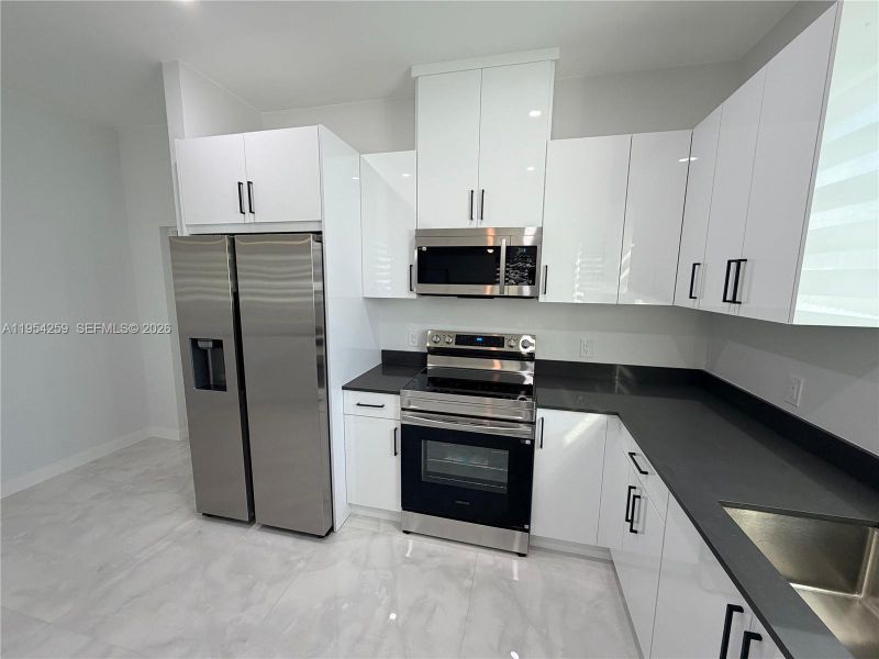 Furnished interior view inside a new home in , Lehigh Acres (Image 4).