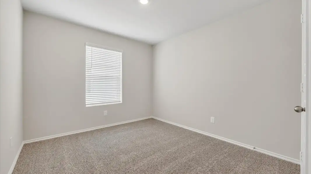 Spacious, unfurnished interior of a new home in Monarch at the Meadows, Ponder (Image 23).