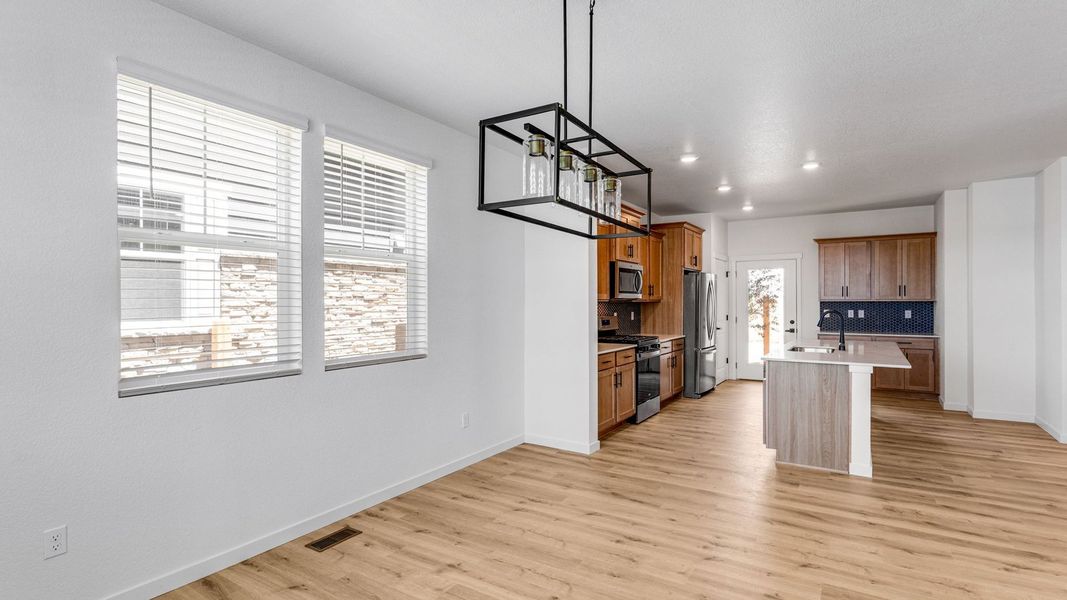 Furnished interior view inside a new home in Horizon Uptown, Aurora (Image 6).