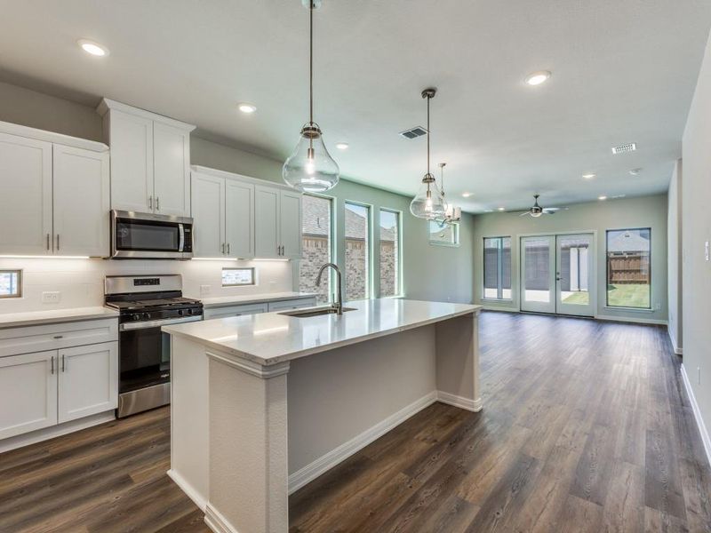 Featuring outstanding storage and prep space plus a spacious kitchen island, any chef would be proud to call this kitchen their own! Featuring outstanding storage and prep space plus a spacious kitchen island, any chef would be proud to call this kitchen their own!